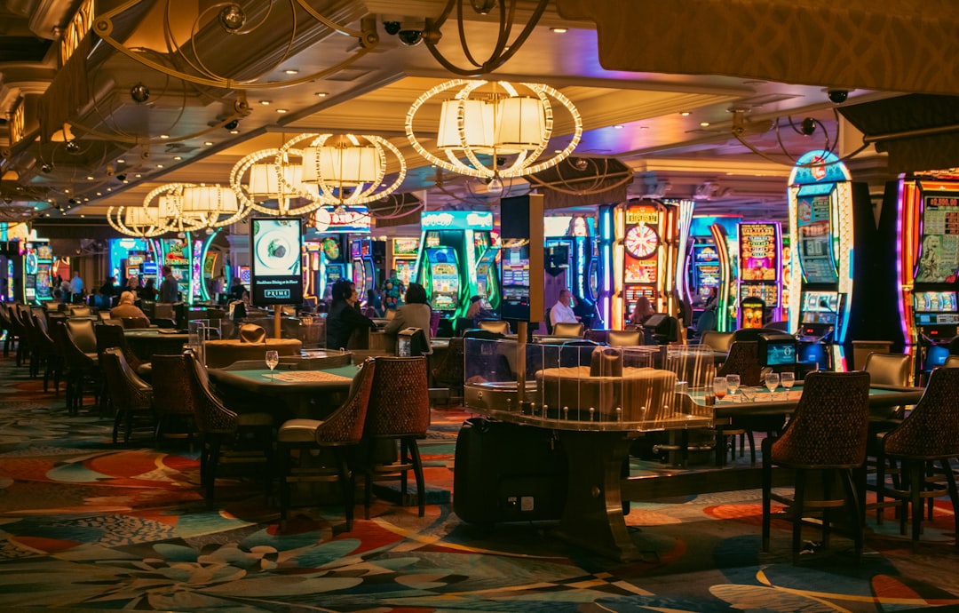 vibrant casino floor with flashing slot machines and gaming tables